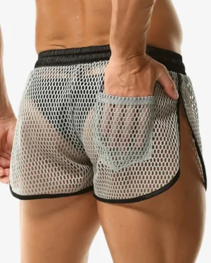 model wearing Sexy mesh men's shorts grey wholesale