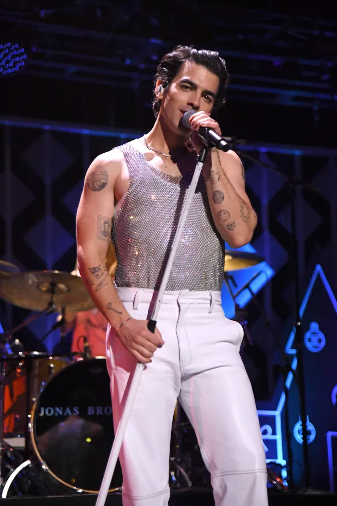 silver rhinestone tank top worn on stage at international arena show men's sparkle party wear