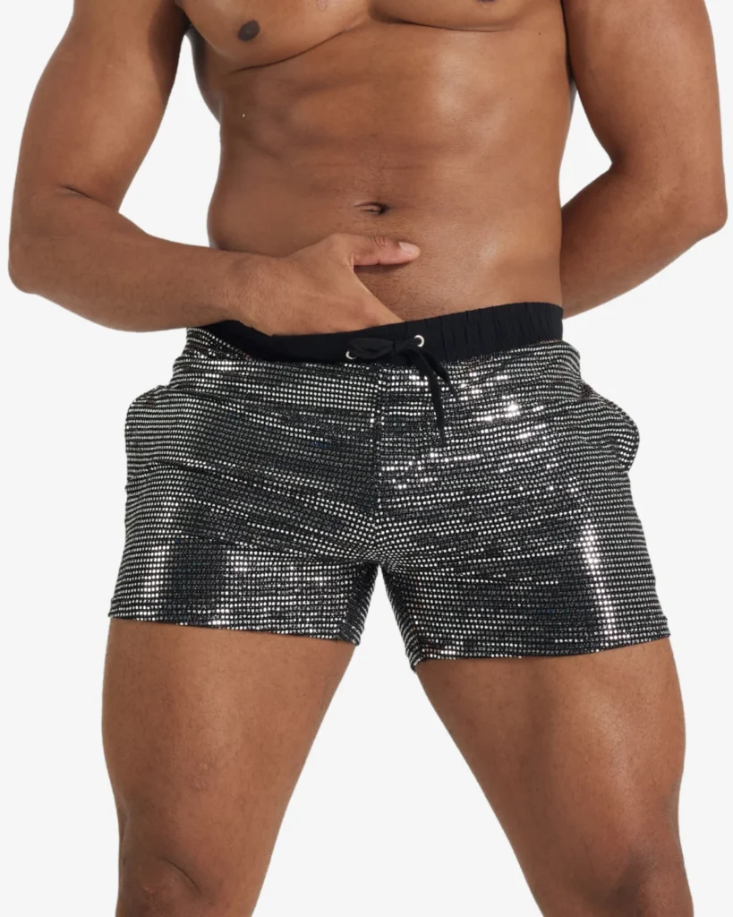 model wearing black sequin party shorts wholesale gay apparel