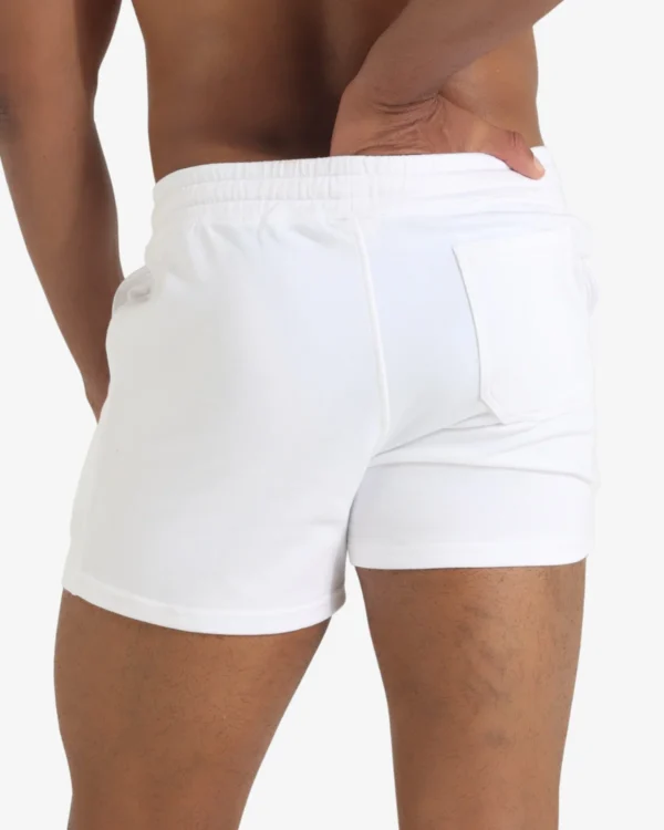 model wearing wholesale men's white cotton party shorts